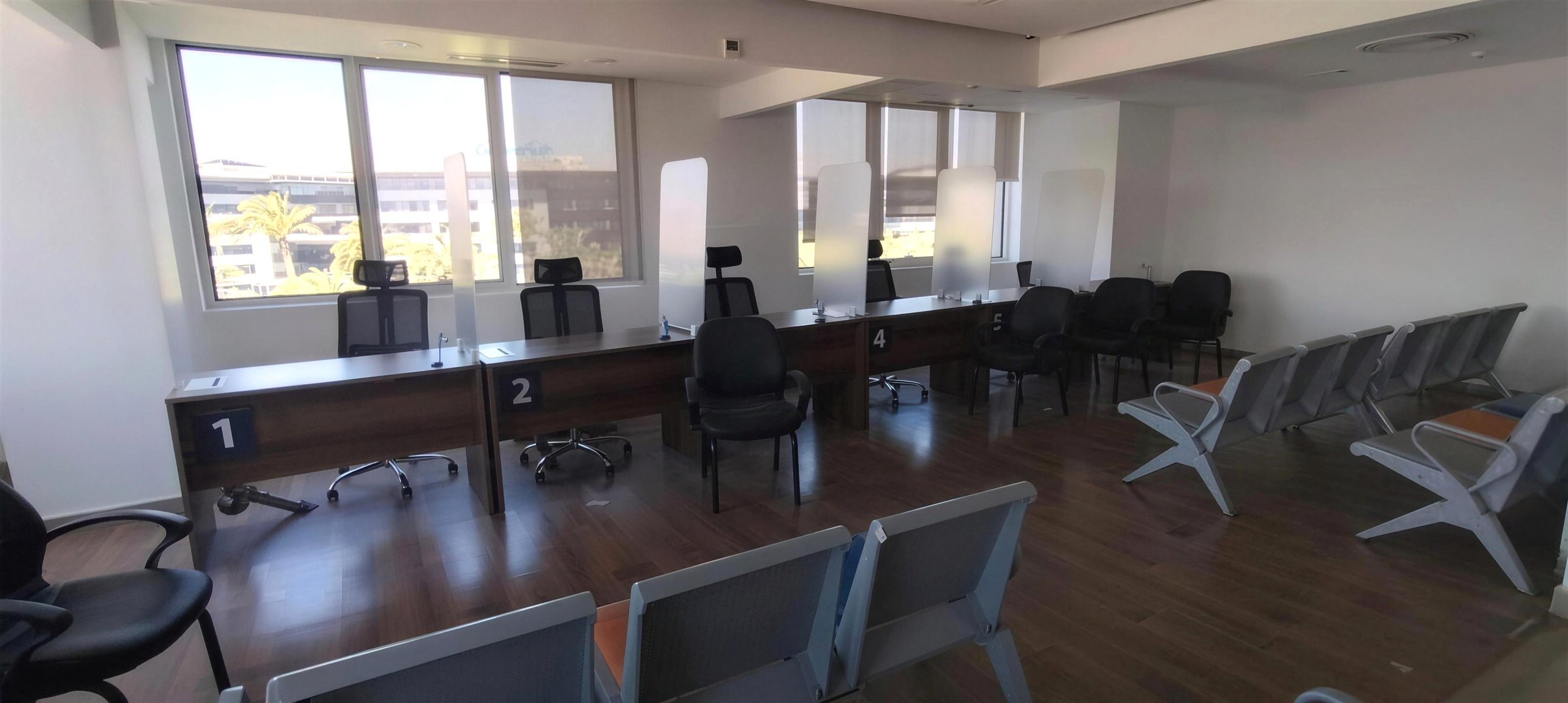 Downtown — training room with fitted desks along a window wall